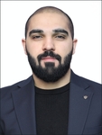 Turan Elşad  Hüseynov
